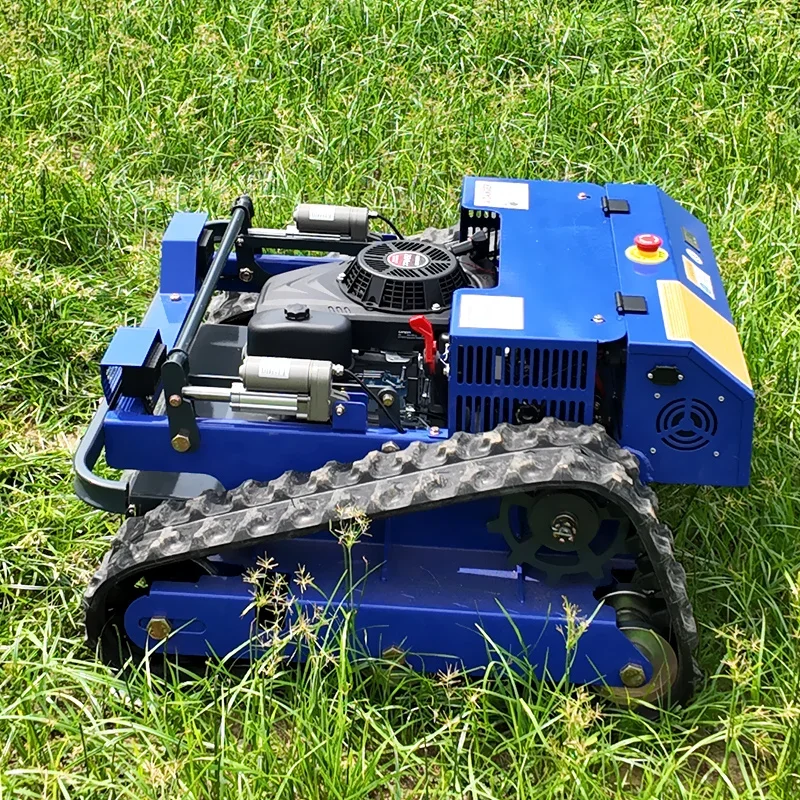 RMOEX 550 tracked mower on grass, three-quarter view